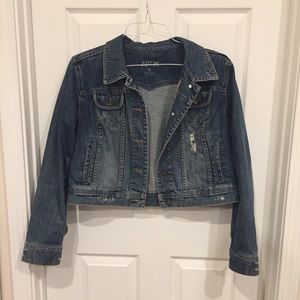 Distressed women’s jean jacket